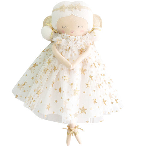 A tall fabric fairy doll in an ivory dress with gold shoes and tulle wings, resting softly against a neutral background.
